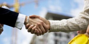 Close-up shot of businesspeople shaking hands
