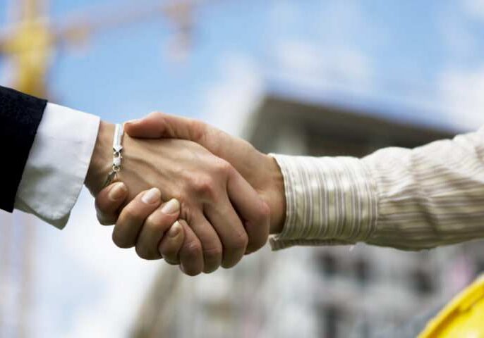 Close-up shot of businesspeople shaking hands